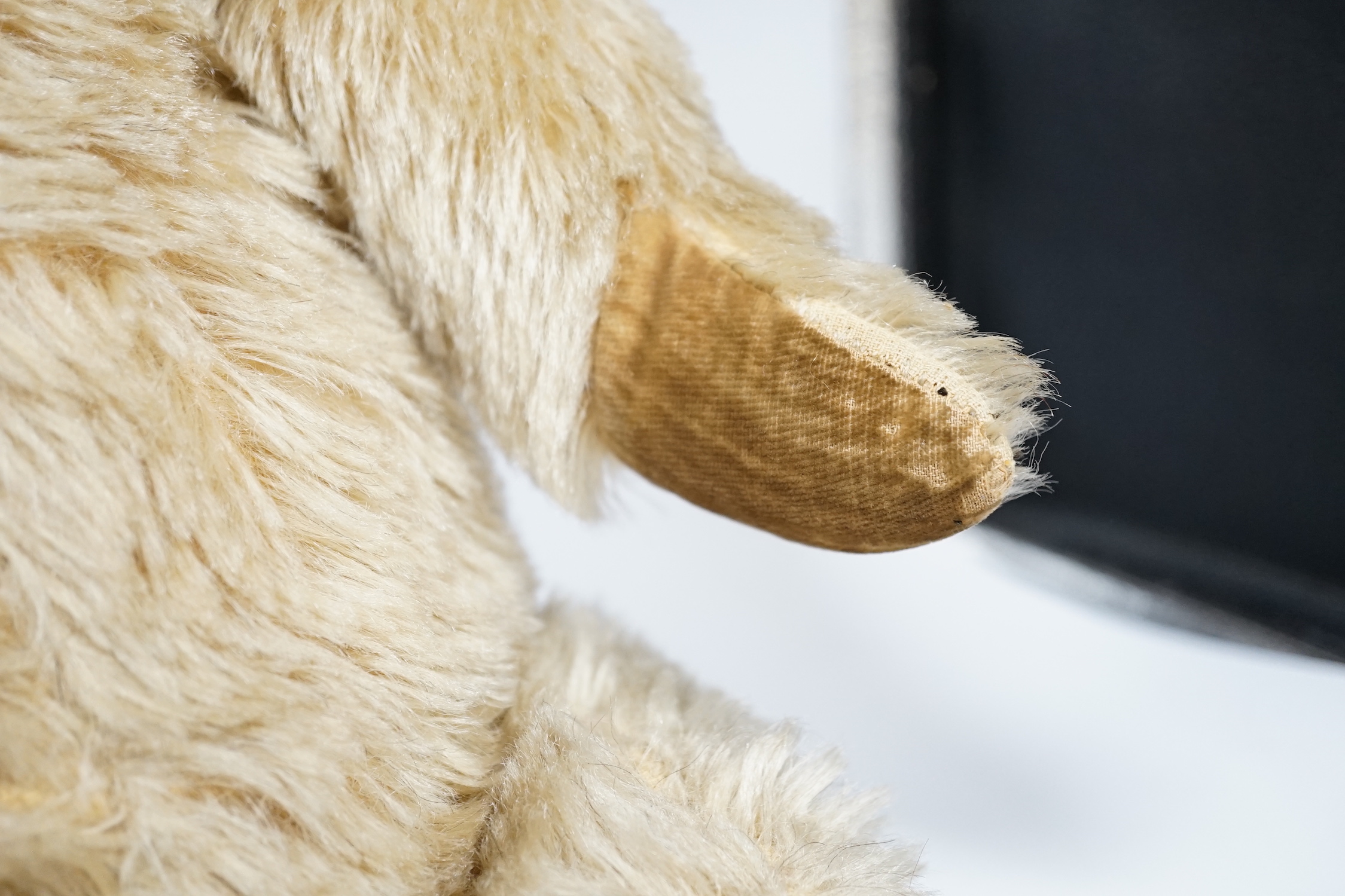 A Chiltern bear c.1950's, 55cm, tear to one velvet pad otherwise in good condition, and a 1930's bear, 50cm, repaired paw pads and nose